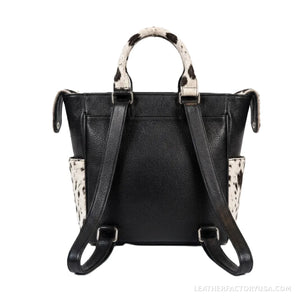 Black and white hair-on cowhide backpack purse – dimensions 14 x 10 x 7 inches