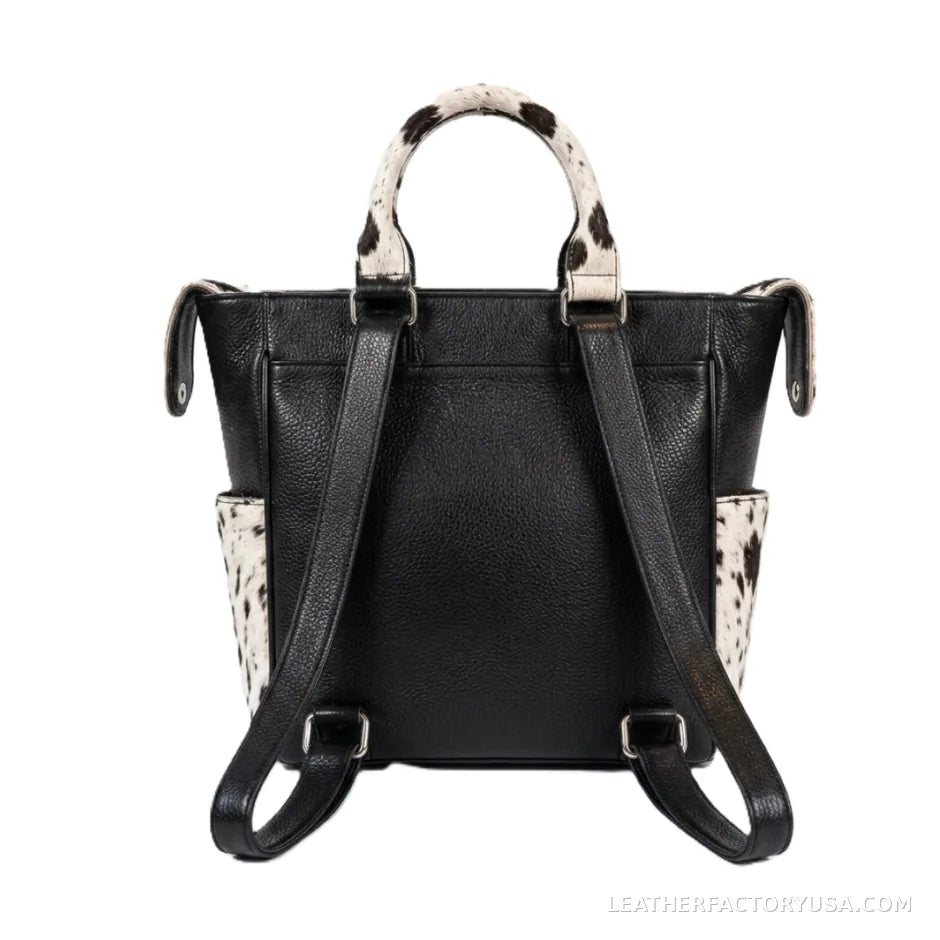 Black and white hair-on cowhide backpack purse – back view showing backpack straps