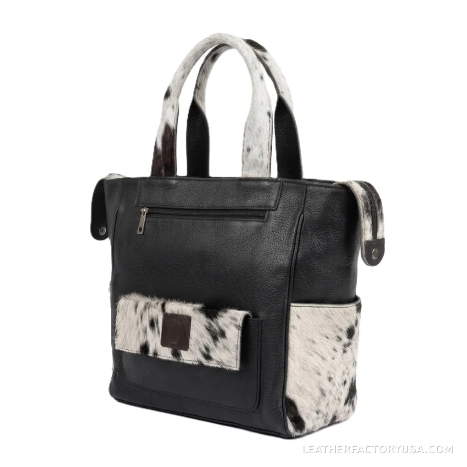 Black and white hair-on cowhide backpack purse – front view