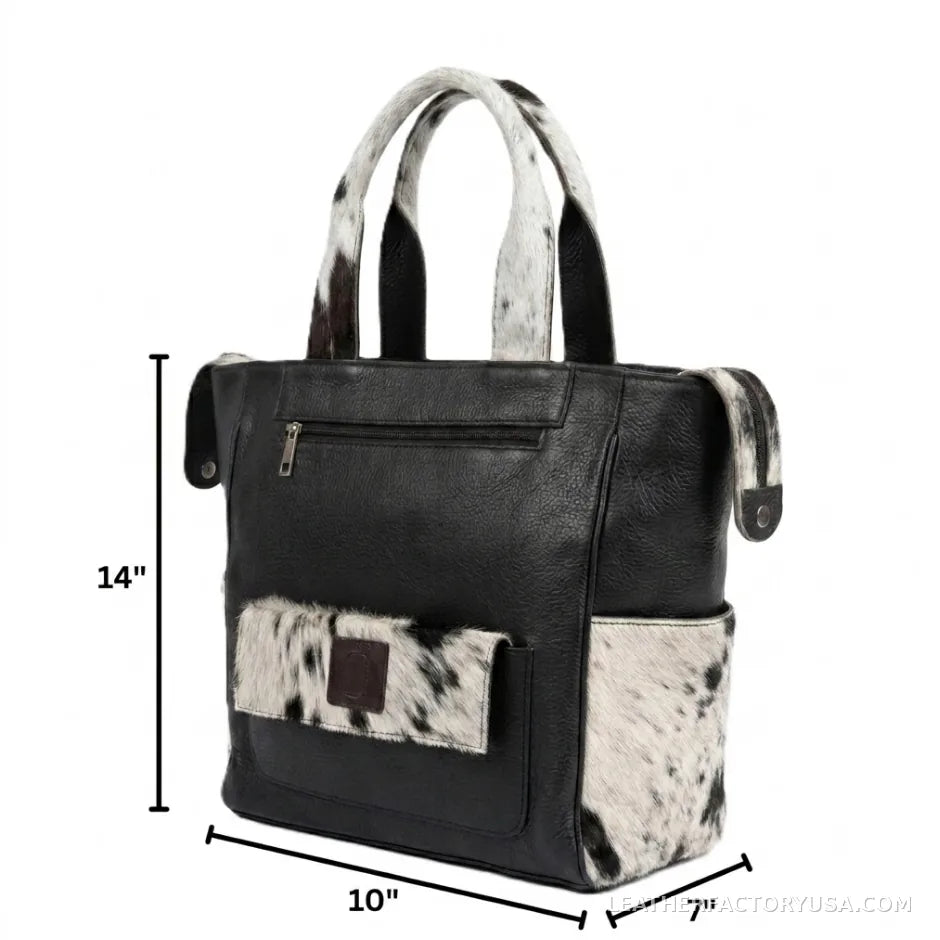 Black and white hair-on cowhide backpack purse – dimensions 14 x 10 x 7 inches