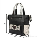 Black and white hair-on cowhide backpack purse – dimensions 14 x 10 x 7 inches