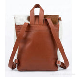 Brown and white hair-on cowhide drawstring backpack – back view with leather straps