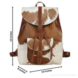 Brown and white hair-on cowhide drawstring backpack – dimensions 14 x 10 x 8 inches