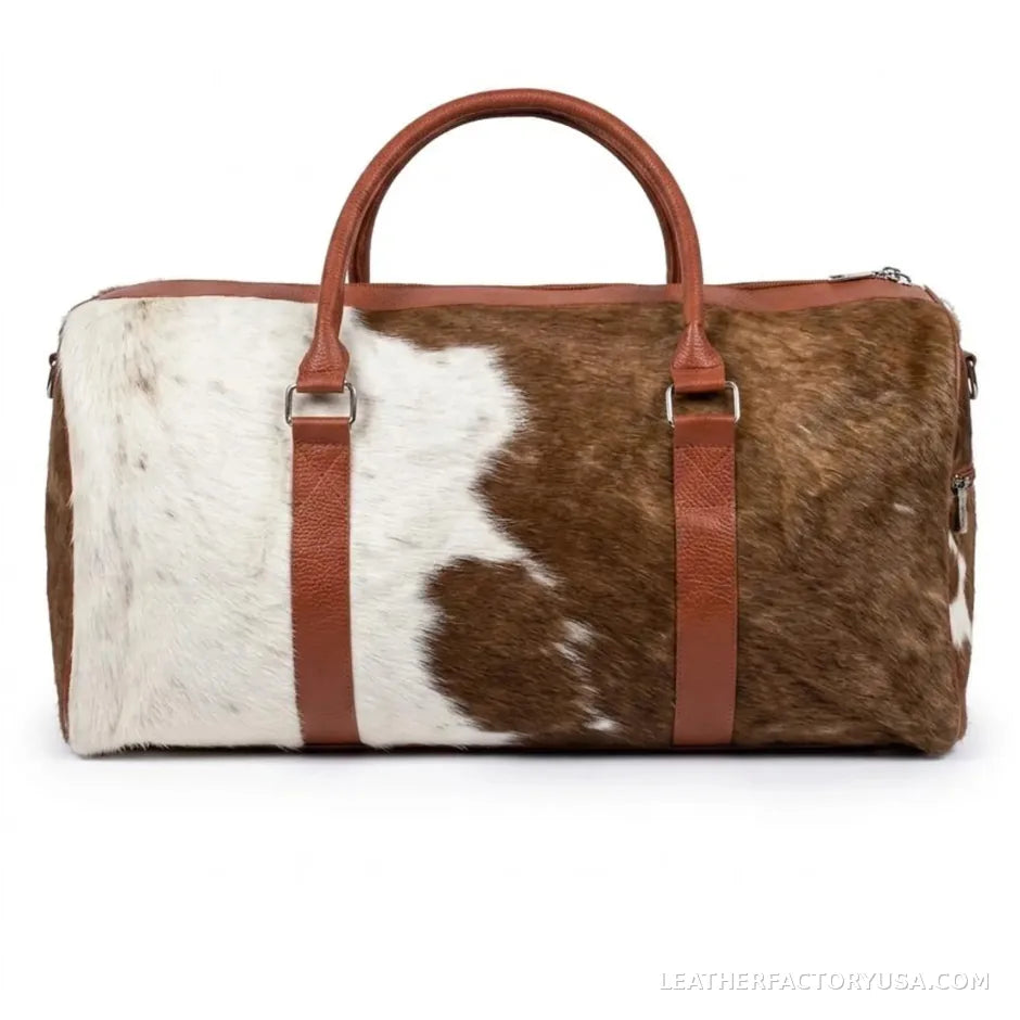 Brown and white hair-on cowhide duffle bag – front view