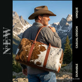 Brown and white hair-on cowhide duffle bag – carried over the shoulder