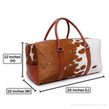 Brown and white hair-on cowhide duffle bag – dimensions 20 x 12 x 10 inches