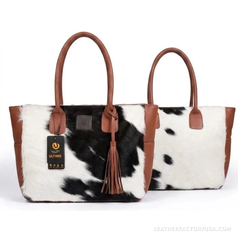 Black and white hair-on cowhide tote bag with tassel – back view