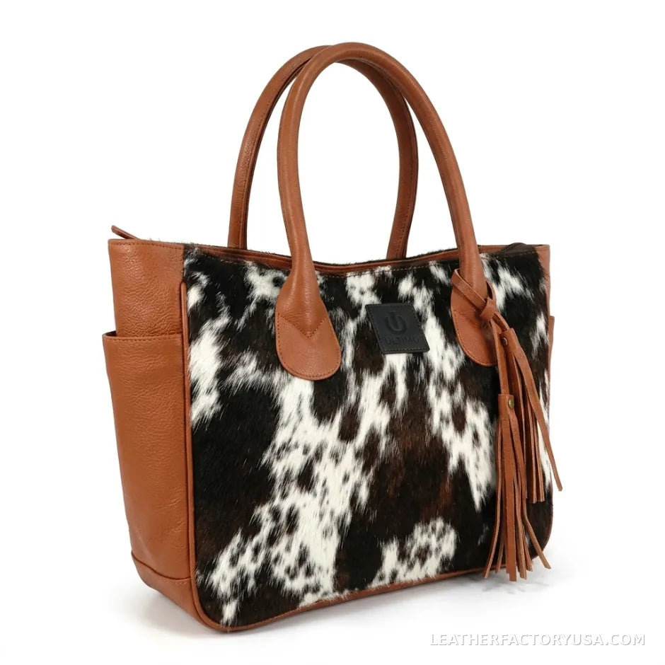 Black and white hair-on cowhide tote bag with tassel – front view