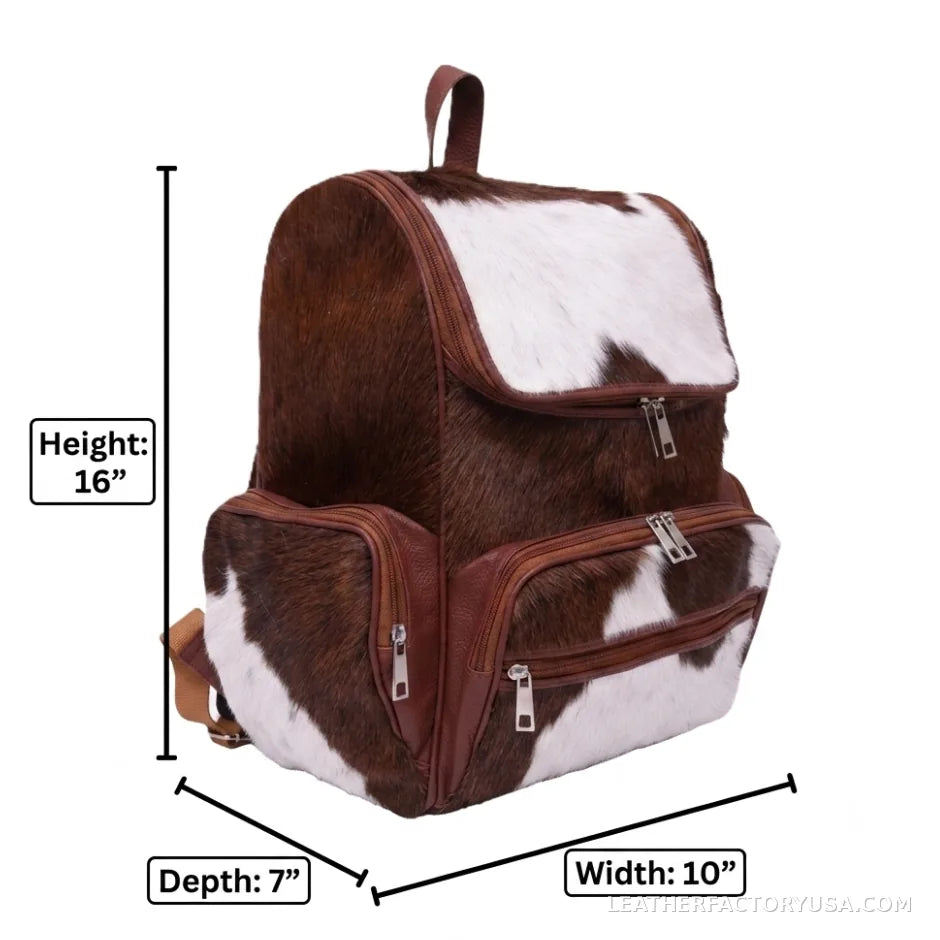 Brown and white hair-on cowhide backpack – dimensions 16 x 10 x 7 inches
