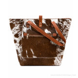 Brown and white hair-on cowhide tote bag – back view with exterior zip pocket
